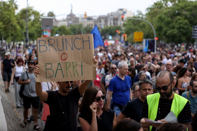 Protesters attend a demonstration against mass tourism in Barcelona, Spain, July 6, 2024. The Catalan capital received more than 12 million tourists in 2023 and expects more in 2024. REUTERS/Bruna Casas