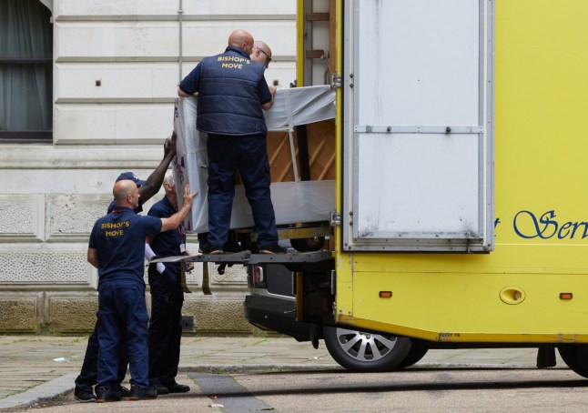 LONDON, ENGLAND - JULY 7: A removals team carries a piano out of Downing Street on July 7, 2024 in London, England. A removals company was removing the contents of Number 10 Downing street after Labour leader, Sir Keir Starmer, ousted conservative Prime Minister Rishi Sunak from office in this week's general election. (Photo by Alex McBride/Getty Images)