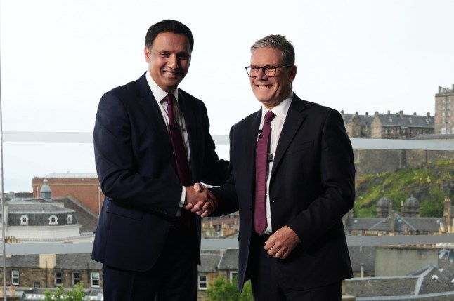 Prime Minister Sir Keir Starmer and Scottish Labour Leader Anas Sarwar during an event in Edinburgh to welcome new Labour MPs in Scotland, following Labour's victory in the 2024 General Election. Picture date: Sunday July 7, 2024. PA Photo. See PA story POLITICS Labour. Photo credit should read: Andrew Milligan/PA Wire