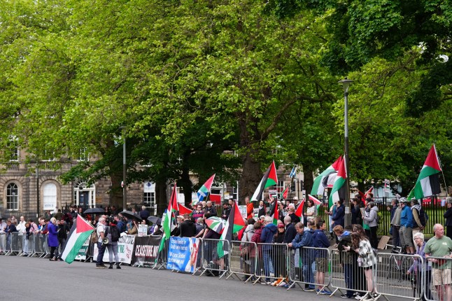 Pro-Palestinian protesters outside Bute House, the official residence of the First Minister of Scotland, in Edinburgh, ahead of the meeting of Prime Minister Sir Keir Starmer and John Swinney in the Scottish capital, during the PM's tour of the UK following Labour's victory in the 2024 General Election. Picture date: Sunday July 7, 2024. PA Photo. See PA story POLITICS Labour. Photo credit should read: Jane Barlow/PA Wire