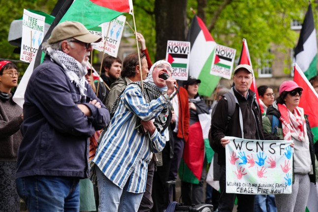 Pro-Palestinian protesters outside Bute House, the official residence of the First Minister of Scotland, in Edinburgh, ahead of the meeting of Prime Minister Sir Keir Starmer and John Swinney in the Scottish capital, during the PM's tour of the UK following Labour's victory in the 2024 General Election. Picture date: Sunday July 7, 2024. PA Photo. See PA story POLITICS Labour. Photo credit should read: Jane Barlow/PA Wire