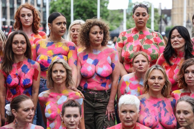 Mandatory Credit: Photo by Shutterstock (14581227e) Loose Women star Nadia Sawalha joins campaigners with painted chests as they staged a protest outside British parliament calling for the breast cancer drug ENHERTU to be made available on the NHS. The drug is available in Scotland and 14 other countries, but not currently in England and Wales. Loose Women Star Nadia Sawalha joins Enhertu Campaigners outside British Parliament, London, UK - 10 Jul 2024