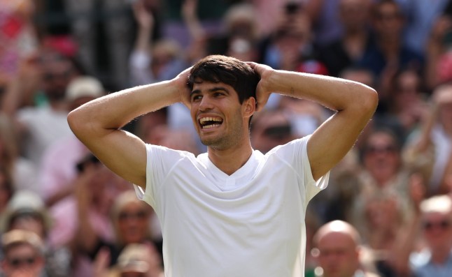 LONDON, ENGLAND - JULY 14: Carlos Alcaraz of Spain celebrates winning Championship point against Novak Djokovic of Serbia in the Gentlemen's Singles Final during day fourteen of The Championships Wimbledon 2024 at All England Lawn Tennis and Croquet Club on July 14, 2024 in London, England. (Photo by Clive Brunskill/Getty Images)