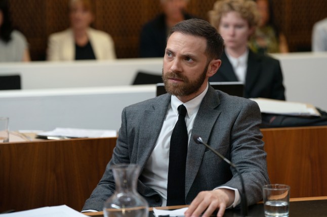 Dean sat in court looking anxious in EastEnders