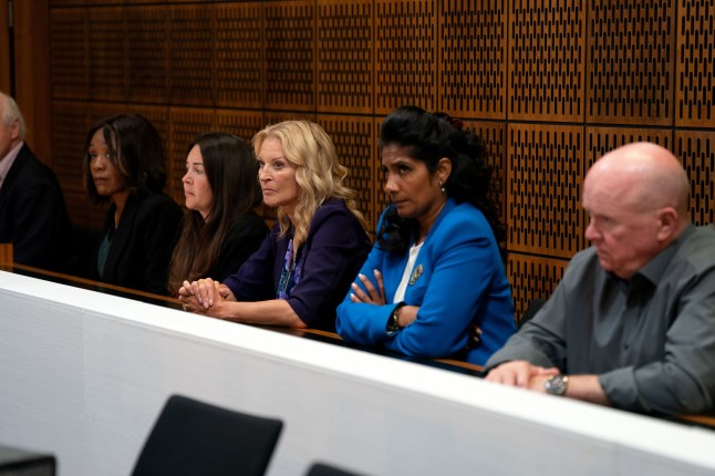 Stacey, Kathy, Suki and Phil sat in the public box in court in EastEnders