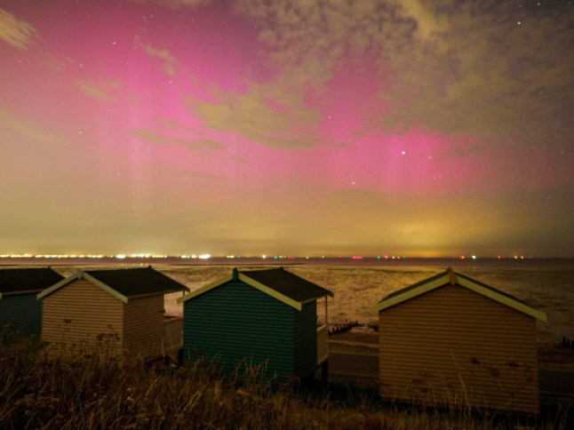 Alamy Live News. 2XT0826 Minster on Sea, Kent, UK. 12th Aug, 2024. UK Weather: stunning display of the Northern Lights (aurora borealis) seen with beach huts in Minster on Sea in Kent this evening. Credit: James Bell/Alamy Live News This is an Alamy Live News image and may not be part of your current Alamy deal . If you are unsure, please contact our sales team to check.