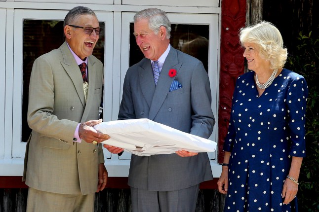 FILE - New Zealand Maori King, Kiingi Tuheitia, from left, reacts with Prince Charles, Prince of Wales, and Camilla, Duchess of Cornwall, at Turangawaewae Marae, Hamilton, New Zealand, Nov. 8, 2015. (David Rowland/Pool Photo via the AP, File)