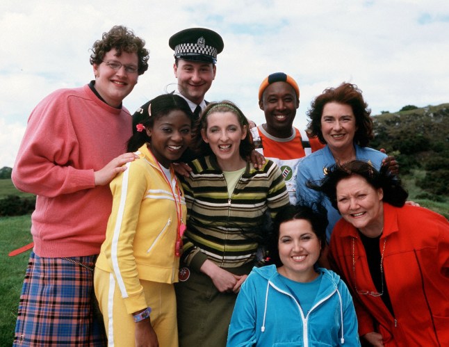 BALAMORY...Picture Show:Back row l to r: MILES JUPP as Archie, BUKI AKIB as Josie Jump, ANDREW AGNEW as PC Plum, JULIE WILSON NIMMO as Ms Hoolie, RODD CHRISTENSEN as Spencer, JULIET CADZOW as Edie McCredie. Front row: KIM TSERKEZIE as Penny Pocket and MARY RIGGANS as Suzie Sweet. Monday, 02 September, CBeebies, 2002 What's the story from Balamory? Meet the residents of Balamory this Autumn on CBeebies, in a new, live action daily programme for pre-school children, set around the adventures of the small island community of Balamory, in Scotland. The cast is a mixture of children and adults - the young children of the local nursey and their teacher, Ms Hoolie. These regular characters will be joined by PC Plum, Archie the inventor, Spencer the Painter, Edie McCready the bus driver, Joise Jump the fitness instructor and Susie Sweet and Penny Pocket who run the local sweet shop. WARNING: This copyright image may be used only to publicise current BBC programmes or other BBC output. Any other use whatsoever without specific prior approval from the BBC may result in legal action....CBeebies Monday, 02 September, CBeebies, Unmanipulated picture (Mary Riggans died 2/12/2013)