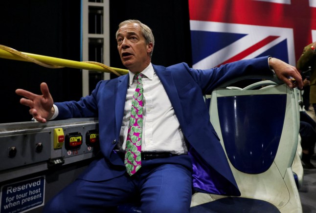 Britain's Reform UK Party Leader Nigel Farage speaks to reporters on the top of the bus, after a rally at the NEC in Birmingham, Britain, June 30, 2024. REUTERS/Hollie Adams