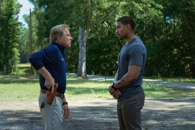 Don Johnson as Chief Sandy Burnne, left, and Aaron Pierre as Terry Richmond face off in a scene from Rebel Ridge