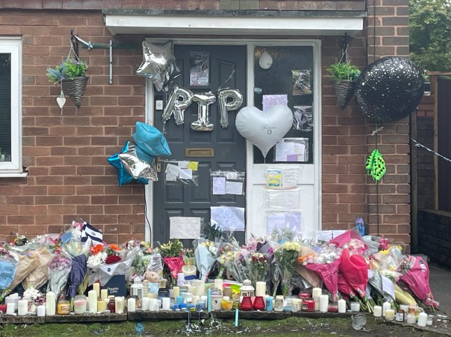 EDITORS NOTE Property numbers have been pixelated by the PA Picture Desk Floral tributes, balloons and messages left outside a property on Lovett Avenue, Oldbury, after 13-year-old Jahziah Coke was stabbed to death. West Midlands Police have charged two teenage boys with the murder of 13-year-old Jahziah who died at his home in Oldbury, near Birmingham despite the efforts of paramedics to save him. Picture date: Tuesday September 3, 2024. PA Photo. See PA story POLICE Oldbury. Photo credit should read: Matthew Cooper/PA Wire