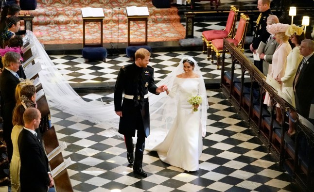 WINDSOR, UNITED KINGDOM - MAY 19: Prince Harry, Duke of Sussex and The Duchess of Sussex depart following their wedding in St George's Chapel at Windsor Castle on May 19, 2018 in Windsor, England. (Photo by Owen Humphries - WPA Pool/Getty Images)