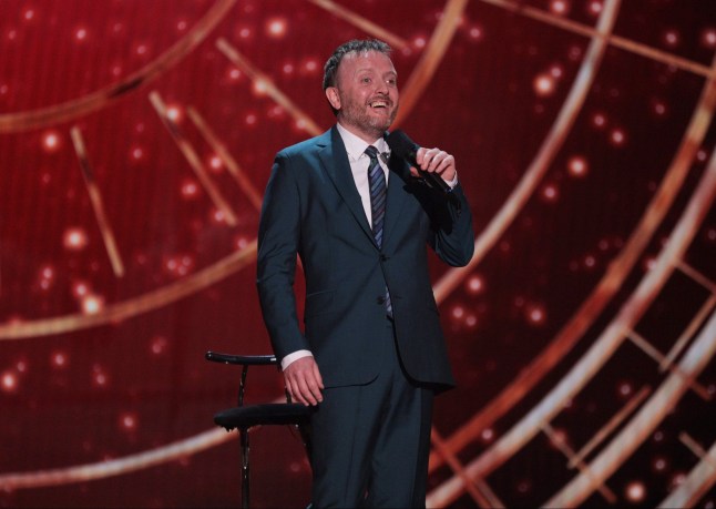 Editorial use only Mandatory Credit: Photo by ITV/Matt Frost/Shutterstock (12637555e) Comedian Chris McCausland performing on stage at the Royal Albert Hall 'The Royal Variety Performance' TV Show, UK - 19 Dec 2021 The Royal Variety Performance 2021, is a British ITV entertainment programme, hosted this year by comedian and presenter Alan Carr, from the world-famous Royal Albert Hall, in the presence of their Royal Highnesses, The Duke and Duchess of Cambridge. The star-studded extravaganza, in aid of the Royal Variety Charity, includes special performances from Ed Sheeran, Sir Rod Stewart, Elvis Costello, Anne-Marie, Years & Years, US jazz singer Gregory Porter and musician James Blunt. Show-stopping moments by the cast of Moulin Rouge the Musical and Matilda the Musical who celebrate ten years in the West End. Stand-up comedy from Bill Bailey, Josh Widdicombe, Judi Love and Chris McCausland. Keala Settle joins to perform the anthemic 'This Is Me', as well as soprano Carly Paoli and singer Jane McDonald, for a special duet. Finally Cirque Du Soleil and hand balancing act The Messoudi Brothers, also perform.