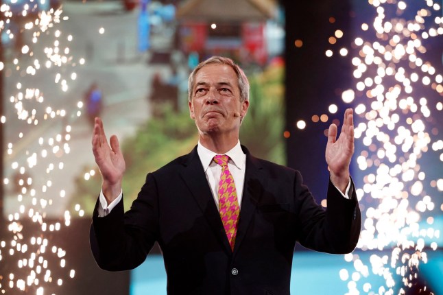 Reform UK party leader Nigel Farage reacts at the end of his speech on the opening day of the Reform UK 2024 annual Party Conference in Birmingham on September 20, 2024. (Photo by BENJAMIN CREMEL / AFP) (Photo by BENJAMIN CREMEL/AFP via Getty Images)