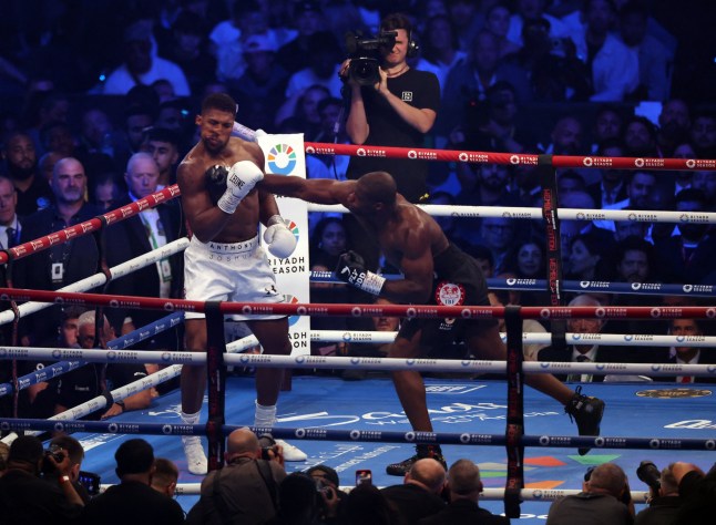 Boxing - Daniel Dubois v Anthony Joshua - IBF World Heavyweight Title - Wembley Stadium, London, Britain - September 21, 2024 Daniel Dubois knocks down Anthony Joshua Action Images via Reuters/Andrew Boyers