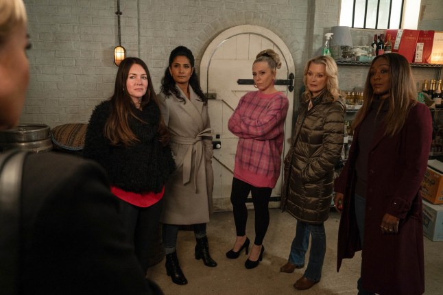 Sharon faces Stacey, Suki, Linda, Kathy and Denise in the barrel store in EastEnders