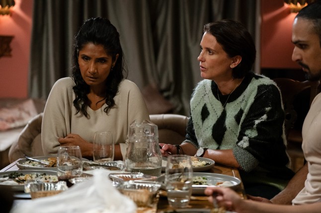 Suki Panesar and Eve Unwin have a tense conversation during a family dinner in EastEnders