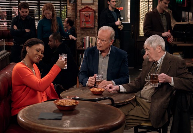 Undated handout photo issued by Paramount+ of Nicholas Lyndhurst (right) as Frasier's old college buddy turned university professor Alan; Toks Olagundoye (left) as Olivia; and Kelsey Grammer as Frasier Crane in Frasier. A first look at the reboot of popular comedy series Frasier shows Nicholas Lyndhurst drinking pints of beer in a bar with Kelsey Grammer. Paramount+ announced on Tuesday that the new show, with Grammer reprising the titular role as psychiatrist Dr Frasier Crane, has been given an air date in October. Issue date: Tuesday August 22, 2023. PA Photo. See PA story SHOWBIZ Frasier. Photo credit should read: Chris Haston/Paramount+/PA Wire NOTE TO EDITORS: This handout photo may only be used in for editorial reporting purposes for the contemporaneous illustration of events, things or the people in the image or facts mentioned in the caption. Reuse of the picture may require further permission from the copyright holder.