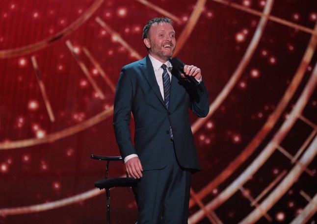 Editorial use only Mandatory Credit: Photo by ITV/Matt Frost/REX/Shutterstock (12637555e) Comedian Chris McCausland performing on stage at the Royal Albert Hall 'The Royal Variety Performance' TV Show, UK - 19 Dec 2021 The Royal Variety Performance 2021, is a British ITV entertainment programme, hosted this year by comedian and presenter Alan Carr, from the world-famous Royal Albert Hall, in the presence of their Royal Highnesses, The Duke and Duchess of Cambridge. The star-studded extravaganza, in aid of the Royal Variety Charity, includes special performances from Ed Sheeran, Sir Rod Stewart, Elvis Costello, Anne-Marie, Years & Years, US jazz singer Gregory Porter and musician James Blunt. Show-stopping moments by the cast of Moulin Rouge the Musical and Matilda the Musical who celebrate ten years in the West End. Stand-up comedy from Bill Bailey, Josh Widdicombe, Judi Love and Chris McCausland. Keala Settle joins to perform the anthemic 'This Is Me', as well as soprano Carly Paoli and singer Jane McDonald, for a special duet. Finally Cirque Du Soleil and hand balancing act The Messoudi Brothers, also perform.