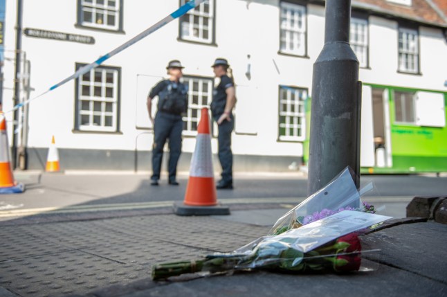 Flowers outside of the cordon next to The John Baker House where Dawn Sturgess, 44 lived. Dawn Sturgess, 44, passed away last night after being exposed to Novichok nerve agent, her partner Charlie Rowley, 45, is still in a critical condition. Salisbury 9th July 2018