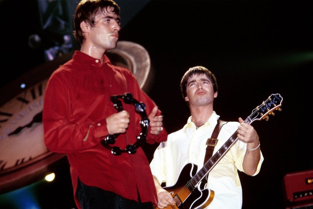 UNITED KINGDOM - SEPTEMBER 01: EARLS COURT Photo of Noel GALLAGHER and Liam GALLAGHER and OASIS, L-R: Liam Gallagher and Noel Gallagher performing live onstage (Photo by Simon Ritter/Redferns)