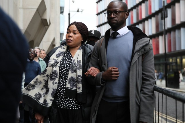 LONDON, ENGLAND - OCTOBER 2: Helen, the mother of Chris Kaba, arrives with supporters outside the Old Bailey before the trial of a Met Police officer being tried for his murder, on October 2, 2024 in London, England. Chris Kaba, 24, was shot dead by Met Police Officer, Martyn Blake, after a police pursuit of his car ended in Streatham Hill on the night of September 5, 2022. No firearms were found at the scene. In an Independent Office for Police Conduct (IOPC) investigation Blake was charged with murder. (Photo by Alishia Abodunde/Getty Images)