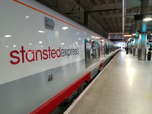 Stansted express train at a station platform.