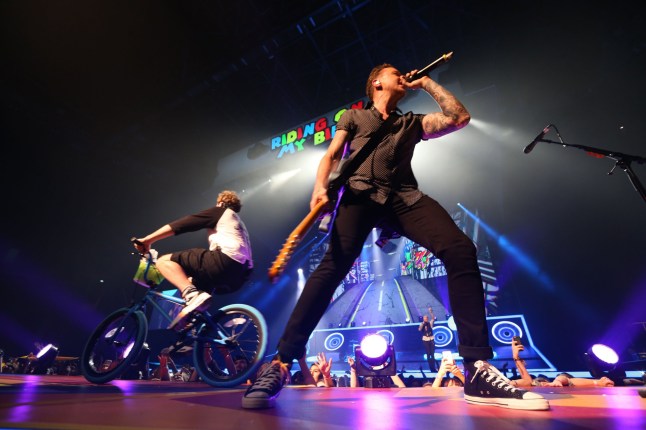 Editorial use only Mandatory Credit: Photo by Andrew Maccoll/REX/Shutterstock (4527691o) McBusted - James Bourne and Danny Jones during the song "Riding On My Bike" McBusted in concert at the Hydro, Glasgow, Scotland, Britain - 12 Mar 2015