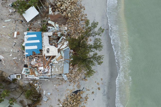 A drone view shows a house destroyed after Hurricane Milton made landfall in Manasota Key, Florida, U.S., October 11, 2024. REUTERS/Ricardo Arduengo