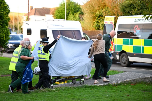 SWANAGE, ENGLAND - OCTOBER 23: Residents from Gainsborough Care Home are transferred from All Saints church hall to other accommodation, on October 23, 2024 in Swanage, England. The Emergency Services are attending an ongoing incident at Gainsborough Care Home in Swanage where three people have died and four people have been taken to hospital. Dorset Police say the deaths are currently unexplained. (Photo by Finnbarr Webster/Getty Images)