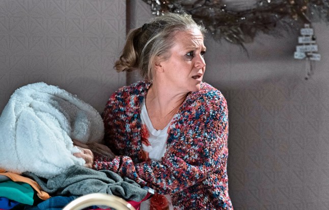 EastEnders picture shows Linda Carter looking worse for wear and panicked as she hides a bottle of booze in the washing at Sharon's