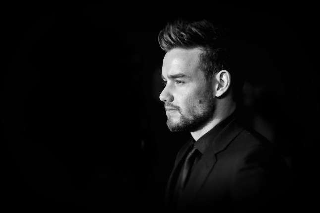 Liam Payne faces away from camera in black and white image