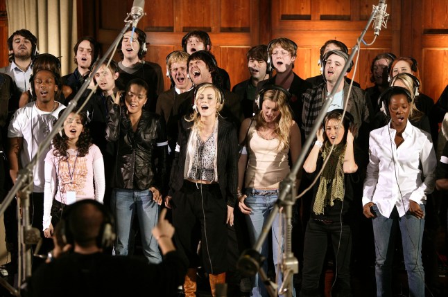 Top British musical artists record the 20th anniversary remake of Midge Ure and Sir Bob Geldof's 1984 charity single "Do They Know It's Christmas?" at Air Studios, Hamsptead on November 14, 2004 in London. (Photo by Dave Hogan/Distributed by Getty Images on behalf of the Band Aid Charitable Trust (The ?Trust?) which holds the copyright in this image. @nogins vocalist singer sing musician Band E91069601