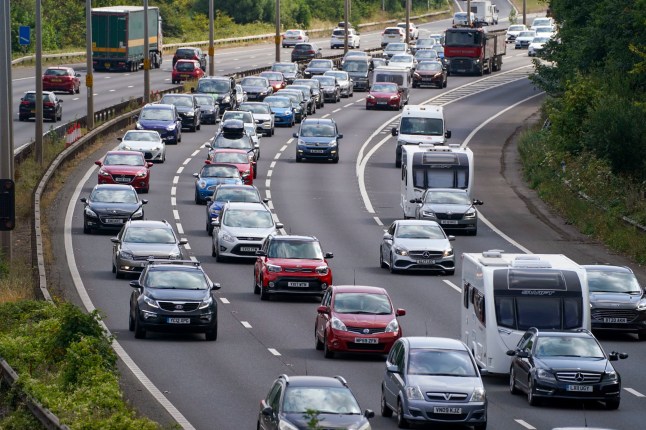 Vehicles queue on the M5 near Portbury, Bristol, as families embark on getaways at the start of summer holidays for many schools in England and Wales. Picture date: Friday July 22, 2022. PA Photo. Fuel price protests are set to make traffic jams even worse during what is expected to be the busiest summer getaway in at least eight years, police have said. With most schools in England and Wales breaking up for summer this week, the RAC said an estimated 18.8 million leisure trips are planned in the UK between Friday and Monday. See PA story TRANSPORT Getaway. Photo credit should read: Steve Parsons/PA Wire