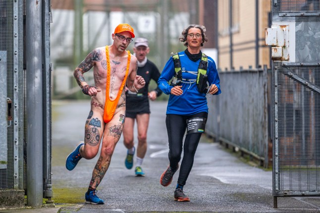 BNPS.co.uk (01202 558833) Pic: MaxWillcock/BNPS Running with conviction... These runners escaped to victory as they completed 26.2 miles in the UK's only marathon inside a prison. There were 135 die hard marathon fans taking on the gruelling challenge - completing 55 laps around the corridors, gangways and prison yard at the Victorian former jail in Dorchester, Dorset. Some got into the spirit by dressing as inmates or police officers.