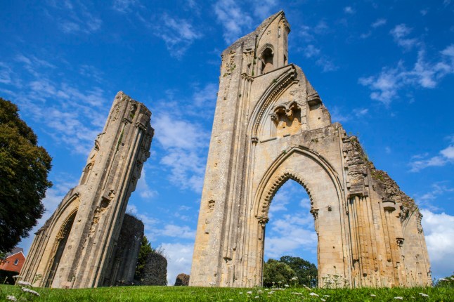 A view of the historic ruins of Glastonbury Abbey in Somerset, UK.