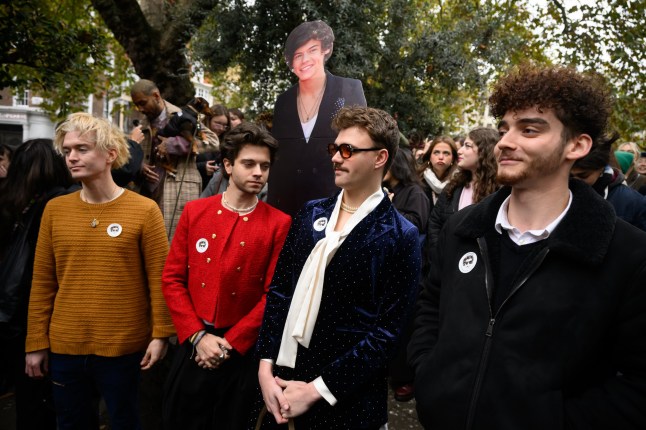 A selection of entrants waits in line ahead of a Harry Styles lookalike competition in Soho Square.