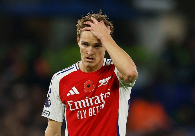 Soccer Football - Premier League - Chelsea v Arsenal - Stamford Bridge, London, Britain - November 10, 2024 Arsenal's Martin Odegaard reacts Action Images via Reuters/Peter Cziborra EDITORIAL USE ONLY. NO USE WITH UNAUTHORIZED AUDIO, VIDEO, DATA, FIXTURE LISTS, CLUB/LEAGUE LOGOS OR 'LIVE' SERVICES. ONLINE IN-MATCH USE LIMITED TO 120 IMAGES, NO VIDEO EMULATION. NO USE IN BETTING, GAMES OR SINGLE CLUB/LEAGUE/PLAYER PUBLICATIONS. PLEASE CONTACT YOUR ACCOUNT REPRESENTATIVE FOR FURTHER DETAILS..