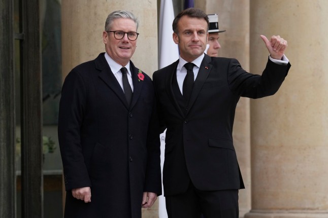 French President Emmanuel Macron, right, and British Prime Minister Keir Starmer pose Monday, Nov. 11, 2024 at the Elysee Palace in Paris, before ceremonies marking the 106th anniversary of the Armistice, a celebration of their countries' friendship, as nations across the world pay tribute to their fallen soldiers in World War I. (AP Photo/Aurelien Morissard)