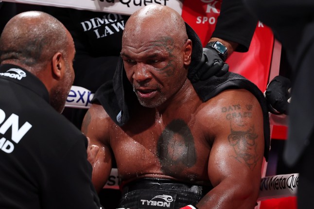 ARLINGTON, TEXAS - NOVEMBER 15: Mike Tyson fights during LIVE On Netflix: Jake Paul vs. Mike Tyson at AT&T Stadium on November 15, 2024 in Arlington, Texas. (Photo by Al Bello/Getty Images for Netflix ?? 2024)