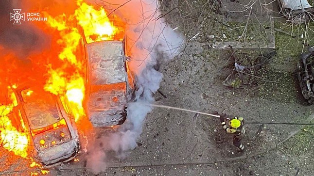 In this photo provided by the Ukrainian Emergency Service, emergency services personnel work to extinguish a fire following a Russian rocket attack in Poltava region Ukraine, Sunday, Nov. 17, 2024. (Ukrainian Emergency Service via AP)