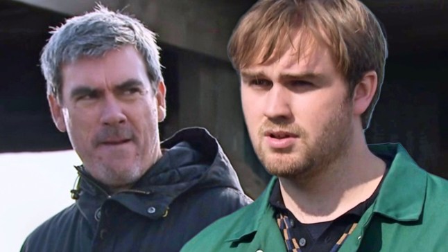 Cain Dingle seethes as he stares out Tom King, who looks unimpressed, in Emmerdale