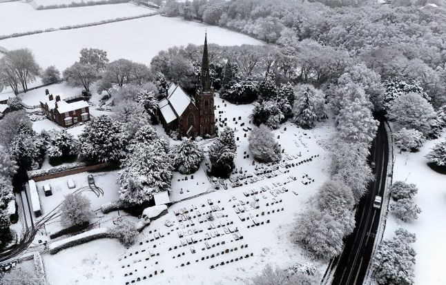 KEELE - NOVEMBER 19: Snow is seen on rooftops on November 19, 2024 in Keele. The Met Office has issued warnings for snow and ice across parts of Northern Ireland, Scotland, Northern England, and the Midlands, as a low pressure system from the Atlantic brings freezing temperatures. (Photo by Carl Recine/Getty Images)