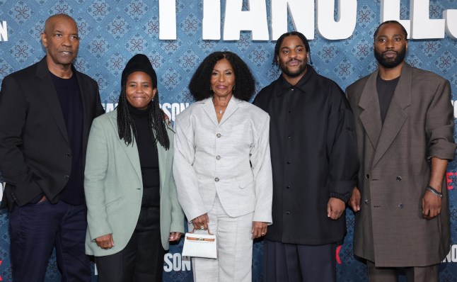 Pauletta Washington, Katia Washington, Malcolm Washington, John David Washington, Denzel Washington all dressed in formal clothing on the red carpet