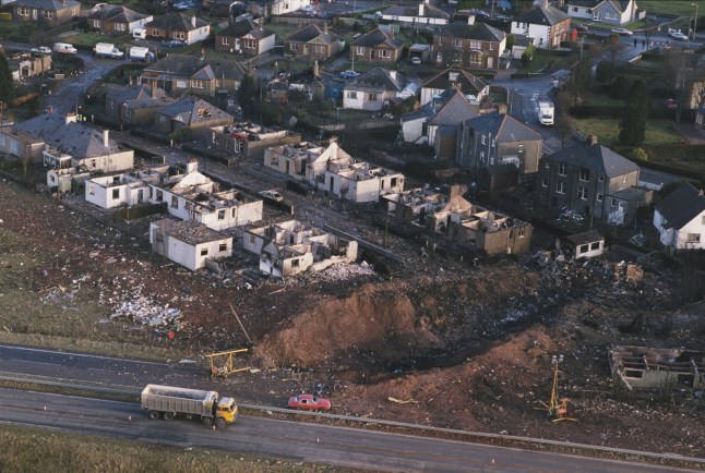 December 1988: Some of the destruction caused by Pan Am Flight 103 after it crashed onto the town of Lockerbie in Scotland, on 21st December 1988. The Boeing 747 'Clipper Maid of the Seas' was destroyed en route from Heathrow to JFK Airport in New York, when a bomb was detonated in its forward cargo hold. All 259 people on board were killed, as well as 11 people in the town of Lockerbie. (Photo by Bryn Colton/Getty Images)