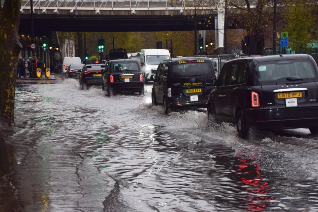 Mandatory Credit: Photo by Vuk Valcic/ZUMA Press Wire/Shutterstock (14948146b) People walk along a waterlogged Victoria Embankment as Storm Conall, the third storm of the season, brings heavy rain and flooding to parts of England. Storm Conall brings heavy rain and flooding to England, London, Uk - 27 Nov 2024