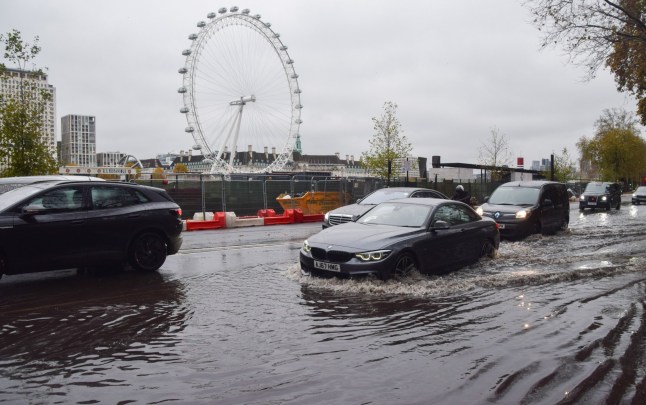 Mandatory Credit: Photo by Vuk Valcic/ZUMA Press Wire/Shutterstock (14948146f) People walk along a waterlogged Victoria Embankment as Storm Conall, the third storm of the season, brings heavy rain and flooding to parts of England. Storm Conall brings heavy rain and flooding to England, London, Uk - 27 Nov 2024