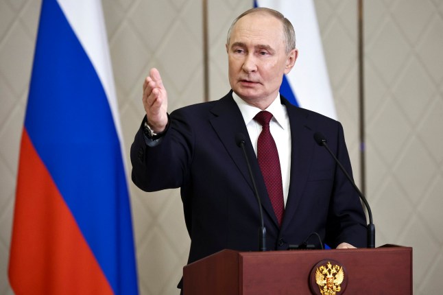 Russian President Vladimir Putin gestures while speaking to the media after the summit of the Collective Security Treaty Organisation in Astana, Kazakhstan, Thursday, Nov. 28, 2024. (Mikhail Tereshchenko, Sputnik, Kremlin Pool Photo via AP)