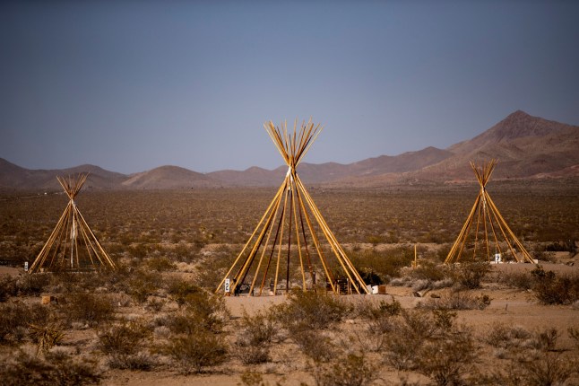 ATTENTION: This Image is part of a PHOTO SET Mandatory Credit: Photo by ETIENNE LAURENT/EPA-EFE/REX/Shutterstock (12918269ab) Tepee (tipi) structures in the town of Nipton, California, USA, 29 April 2022. Stuck between a railroad and the Mojave desert, the small town of Nipton, located at the border between California and Nevada, has been sold again, this time to a group from Las Vegas for 2.75 million US dollars. The first time the town was sold for five million dollars in 2017 to a large cannabis company who tried to rebrand it as Magical Nipton, a cannabis retreat. As the company planned to turn Nipton into a cannabis retreat, it spent on infrastructures, installing eco-friendly cabins, tipis and art installations as well as restoring the town's historic structures. However, the project did not come to term and Nipton went back to its previous owner Roxanne Lang. California desert town of Nipton sold again after cannabis retreat project failure, USA - 29 Apr 2022