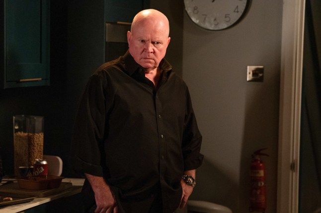 Phil Mitchell looks lonely as he stands in the kitchen in EastEnders